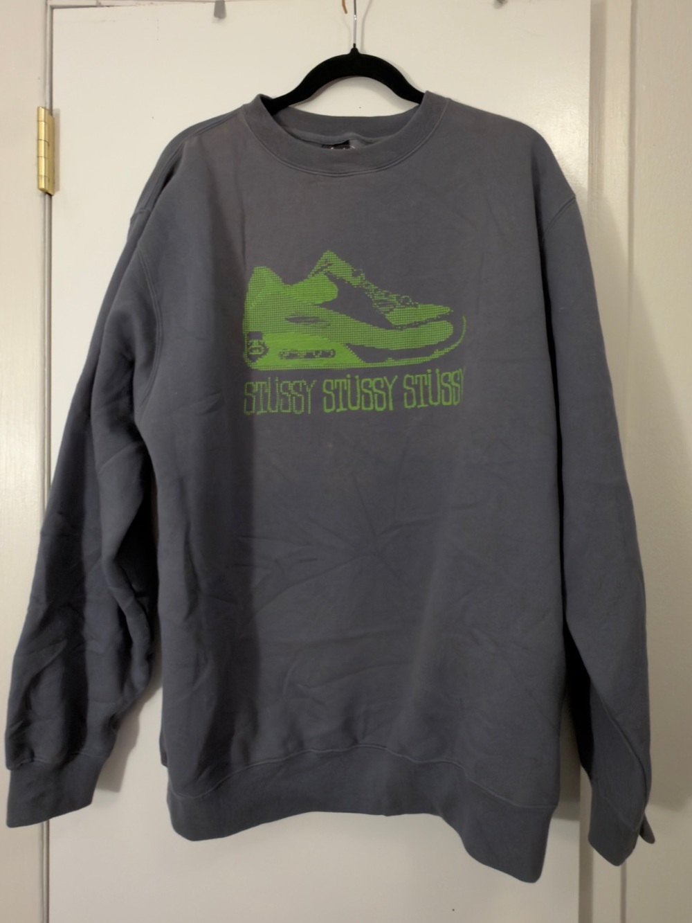 Gray Stüssy crewneck sweatshirt with green sneaker graphic, size L